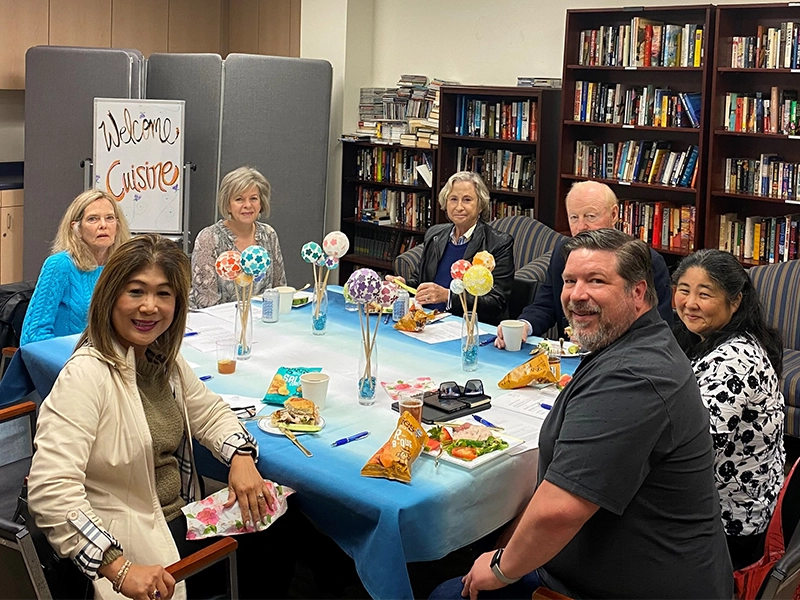 group-of-volunteers-sitting-around-table